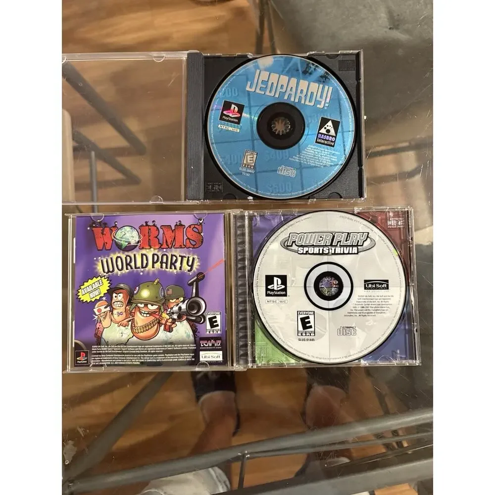 Sony PlayStation 1 PS1 Game Lot Jeopardy Power Play Sports Trivia Worms Case